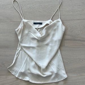 Cream deluc tank size small